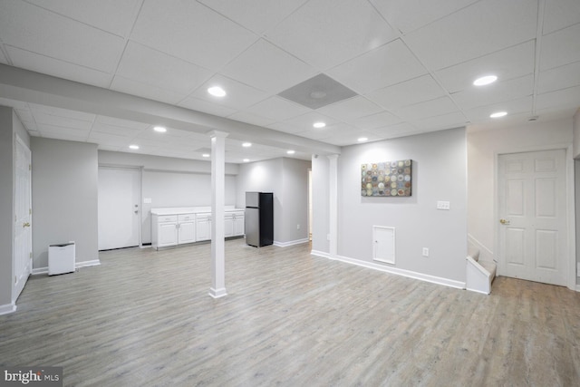 553 Choptank Cove Ct, Annapolis, MD 21401 - finished basement with freestanding refrigerator, light wood finished floors, recessed lighting, and a drop ceiling