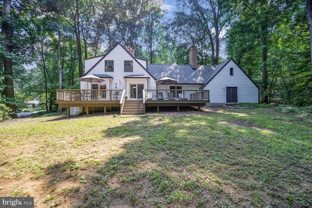 553 Choptank Cove Ct, Annapolis, MD 21401 - back of property featuring a deck, a chimney, and a lawn