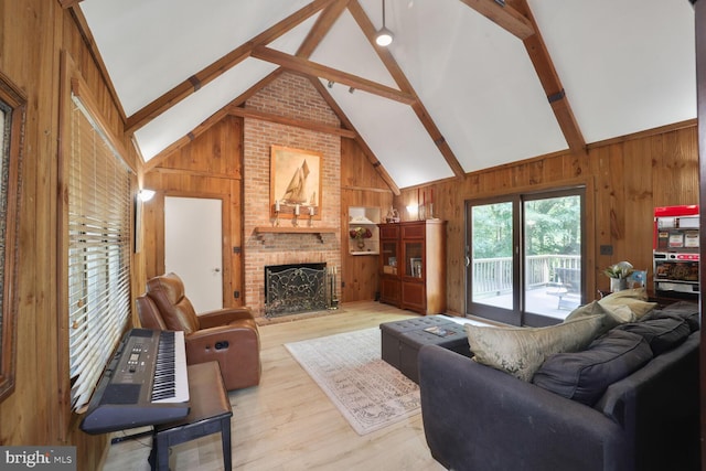 553 Choptank Cove Ct, Annapolis, MD 21401 - living room with wooden walls, a brick fireplace, wood finished floors, beam ceiling, and high vaulted ceiling