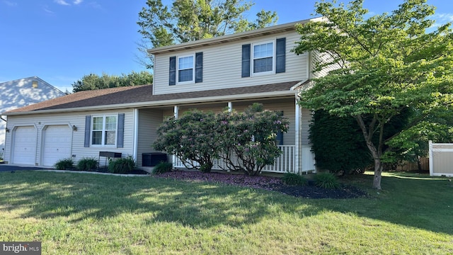 10 Berwick Ln, Sicklerville, NJ 08081 - view of front of property featuring a porch, an attached garage, and a front lawn