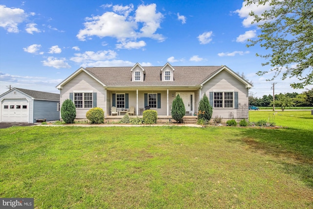 32105 Judiths Ln, Frankford, DE 19945 - view of front facade featuring an outbuilding, a porch, a garage, a front yard, and roof with shingles