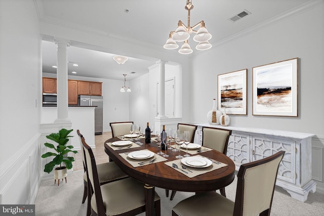 9713 Handerson Pl Unit 203, Manassas Park, VA 20111 - dining room featuring ornate columns, light carpet, crown molding, and a chandelier