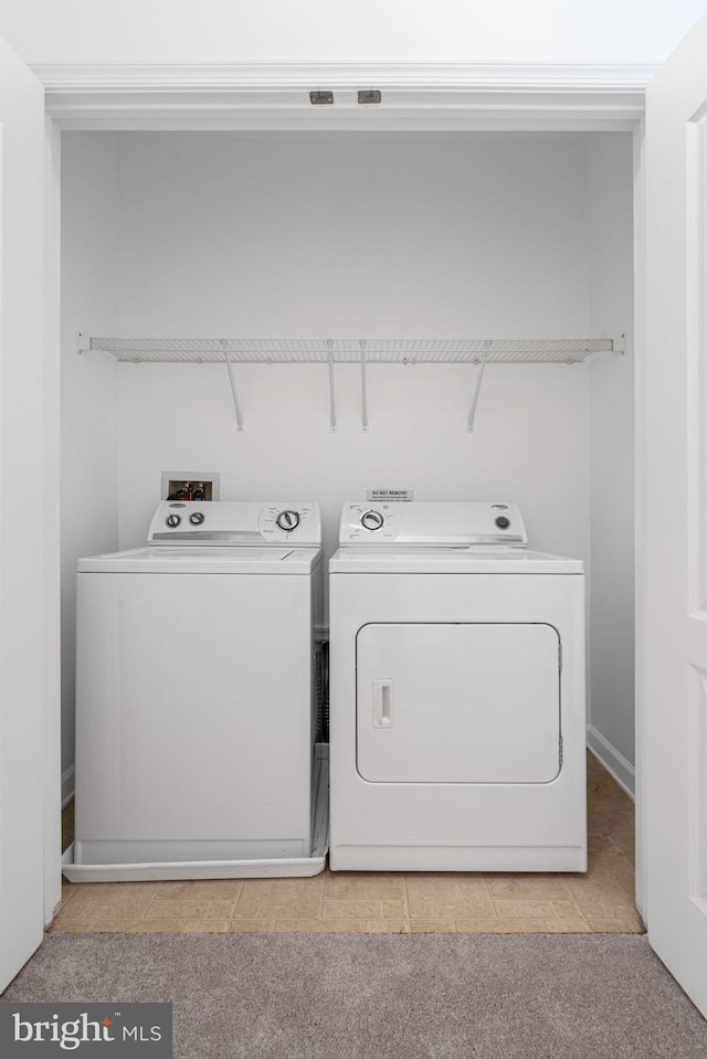 9713 Handerson Pl Unit 203, Manassas Park, VA 20111 - laundry room featuring washer and clothes dryer