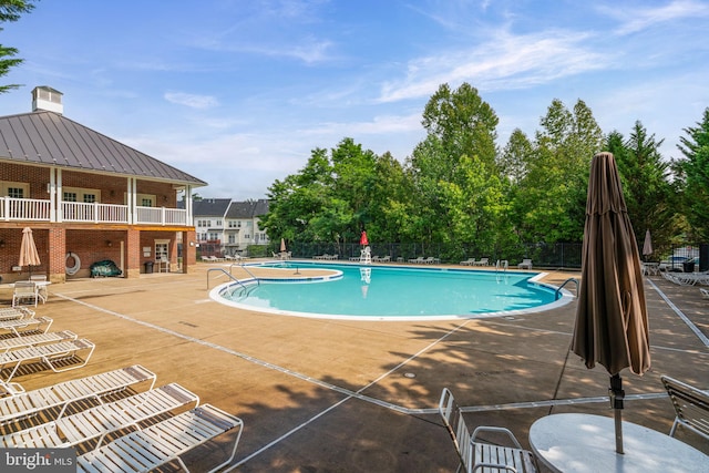 9713 Handerson Pl Unit 203, Manassas Park, VA 20111 - community pool featuring a patio area
