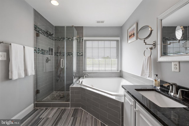 2517 Hunton Pl, Alexandria, VA 22311 - full bathroom featuring a garden tub, vanity, and a stall shower