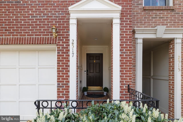 2517 Hunton Pl, Alexandria, VA 22311 - entrance to property featuring a garage and brick siding