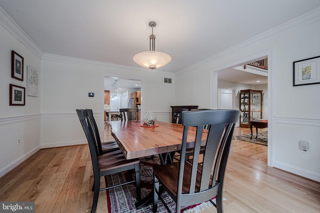 310 Belmont Ct, Lincoln University, PA 19352 - dining space with ornamental molding and light wood-type flooring
