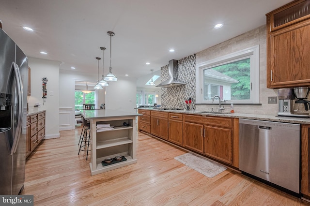 310 Belmont Ct, Lincoln University, PA 19352 - kitchen featuring stainless steel appliances, wall chimney range hood, brown cabinets, light wood-type flooring, and recessed lighting