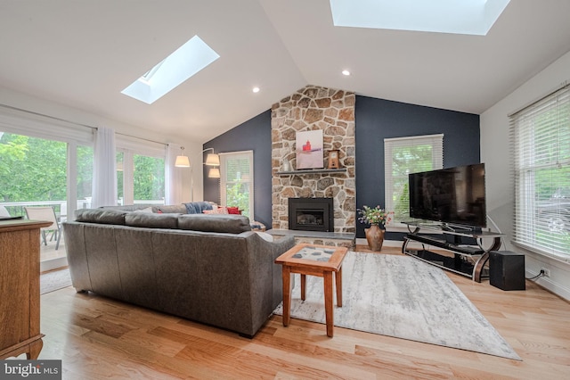 310 Belmont Ct, Lincoln University, PA 19352 - living area featuring a skylight, a fireplace, lofted ceiling, and wood finished floors