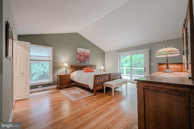 310 Belmont Ct, Lincoln University, PA 19352 - bedroom featuring access to exterior, light wood-style floors, lofted ceiling, and multiple windows