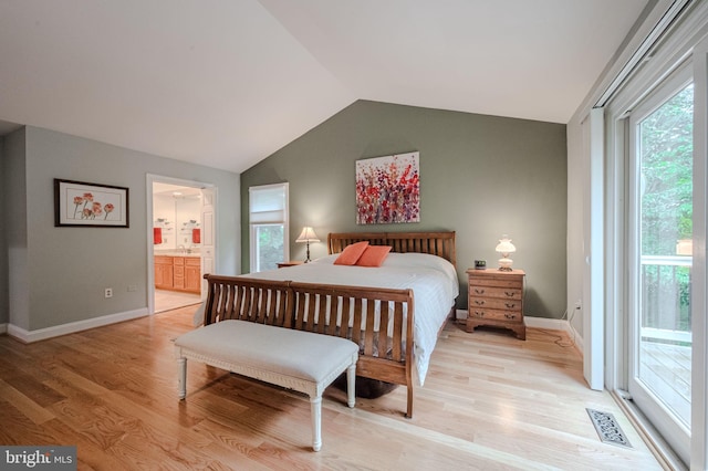 310 Belmont Ct, Lincoln University, PA 19352 - bedroom featuring access to outside, lofted ceiling, light wood finished floors, and connected bathroom