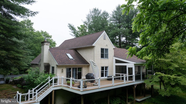 310 Belmont Ct, Lincoln University, PA 19352 - back of house with stucco siding, a wooden deck, roof with shingles, and a chimney
