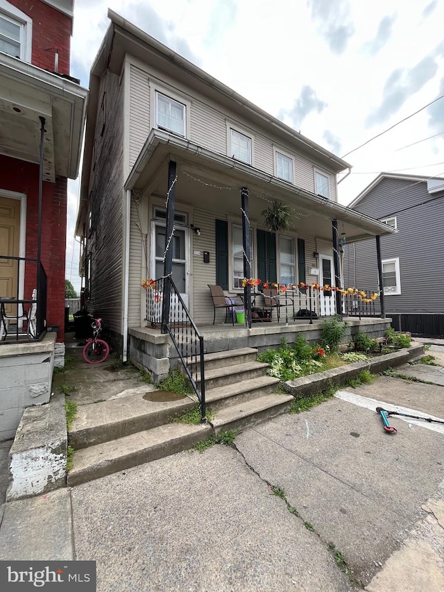 208 S Spruce St, Lewistown, PA 17044 - view of property with covered porch