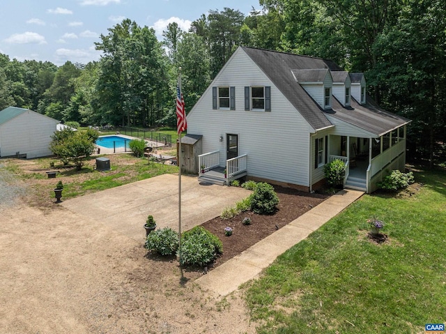 1505 Running Deer Dr, Keswick, VA 22947 - view of property exterior with an outdoor pool and a lawn