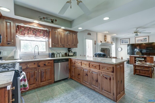1505 Running Deer Dr, Keswick, VA 22947 - kitchen with appliances with stainless steel finishes, a ceiling fan, a peninsula, recessed lighting, and light tile patterned floors