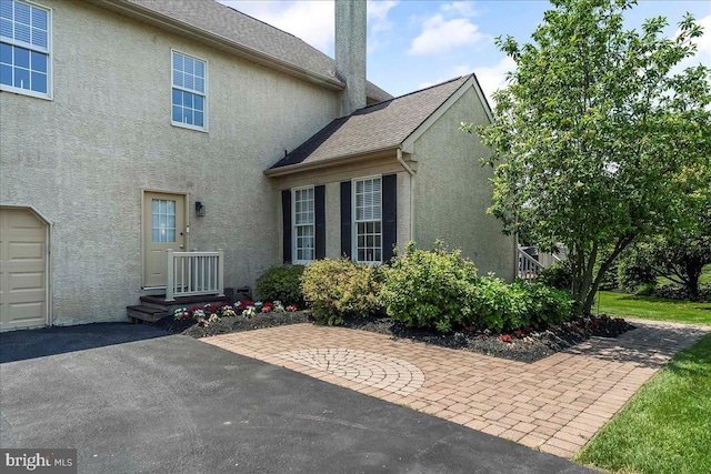 22 Thomas Speakman Dr Unit 76, Glen Mills, PA 19342 - view of front of home featuring stucco siding