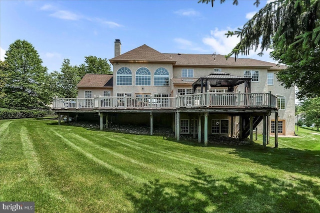 22 Thomas Speakman Dr Unit 76, Glen Mills, PA 19342 - back of property featuring a deck, a gazebo, and a lawn