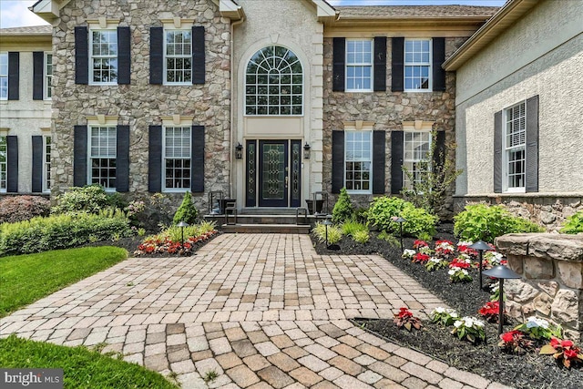 22 Thomas Speakman Dr Unit 76, Glen Mills, PA 19342 - view of exterior entry with stone siding