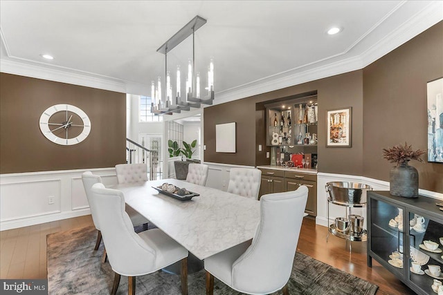 22 Thomas Speakman Dr Unit 76, Glen Mills, PA 19342 - dining area with ornamental molding, dark wood finished floors, wainscoting, recessed lighting, and a chandelier