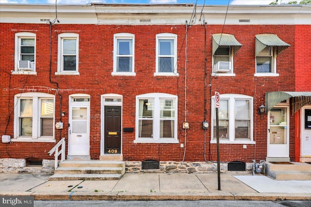 409 N Cherry St, Lancaster, PA 17602 - view of property featuring brick siding and cooling unit