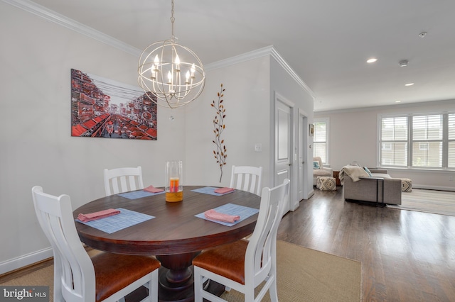 18 S Roberts Rd, Bryn Mawr, PA 19010 - dining area with a chandelier, wood finished floors, ornamental molding, and recessed lighting