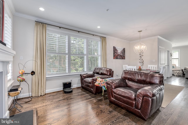 18 S Roberts Rd, Bryn Mawr, PA 19010 - living room featuring a chandelier, ornamental molding, wood finished floors, recessed lighting, and a fireplace