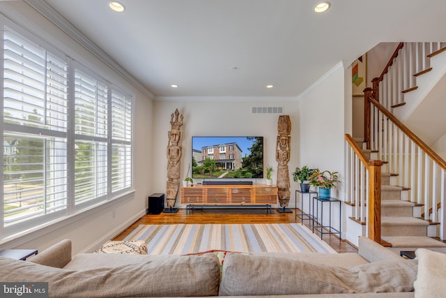 18 S Roberts Rd, Bryn Mawr, PA 19010 - living room with plenty of natural light, wood finished floors, recessed lighting, stairway, and ornamental molding
