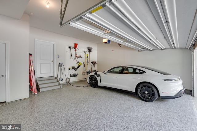 18 S Roberts Rd, Bryn Mawr, PA 19010 - garage featuring a garage door opener