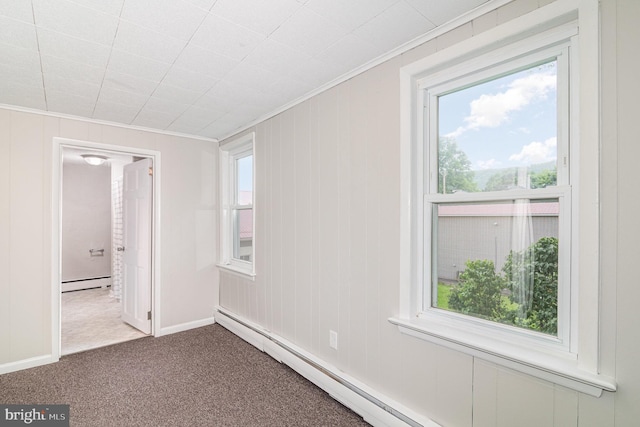 422 N High St, Duncannon, PA 17020 - carpeted spare room featuring a baseboard radiator, crown molding, plenty of natural light, and baseboard heating