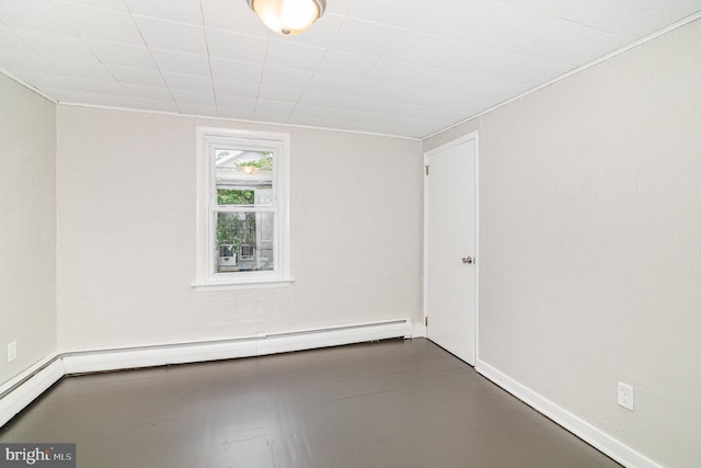 422 N High St, Duncannon, PA 17020 - spare room with baseboards and a baseboard radiator