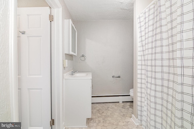 422 N High St, Duncannon, PA 17020 - bathroom with a baseboard heating unit, vanity, a textured ceiling, tile patterned flooring, and curtained shower