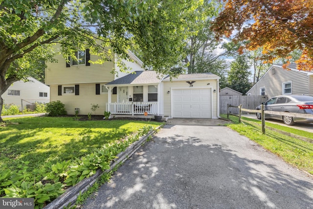 39 Roxeter Rd, New Castle, DE 19720 - colonial-style house with driveway, a garage, and covered porch