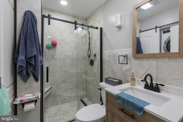 39 Roxeter Rd, New Castle, DE 19720 - full bathroom featuring vanity, a shower stall, and stacked washer / dryer