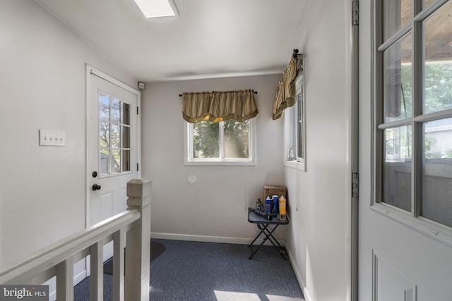 39 Roxeter Rd, New Castle, DE 19720 - entryway featuring carpet flooring and baseboards