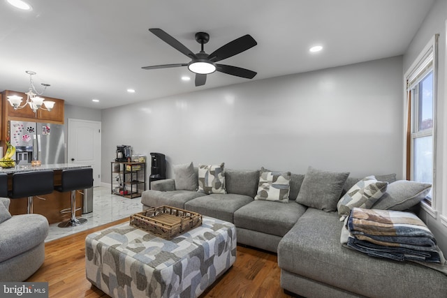 39 Roxeter Rd, New Castle, DE 19720 - living area with light wood-style flooring, recessed lighting, a chandelier, and a ceiling fan