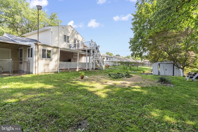 39 Roxeter Rd, New Castle, DE 19720 - view of yard with a storage shed, stairway, and a wooden deck