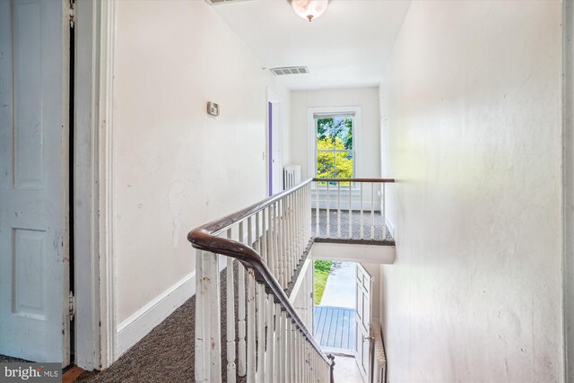 209 E Broad St, Falls Church, VA 22046 - staircase featuring baseboards and carpet flooring