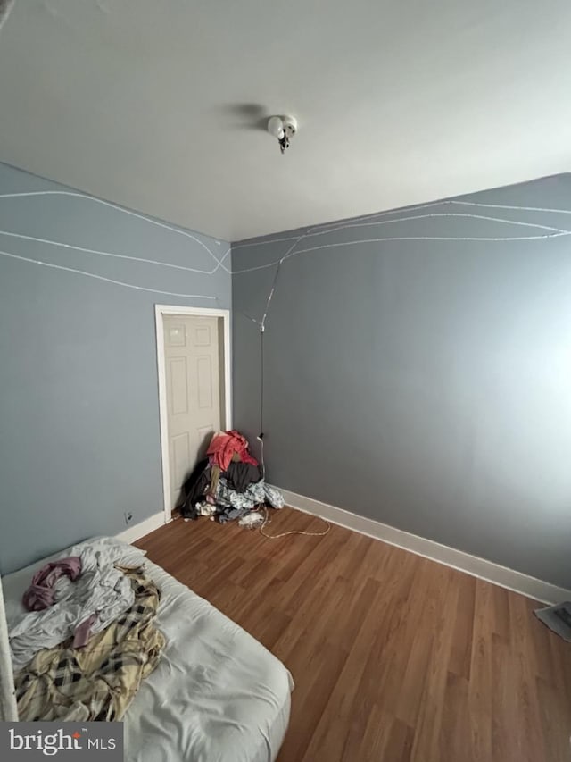 2446 N Bouvier St, Philadelphia, PA 19132 - bedroom with wood finished floors and baseboards