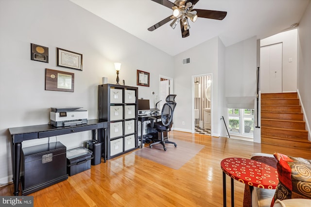 904 Hyde Rd, Silver Spring, MD 20902 - office area featuring wood finished floors, ceiling fan, and high vaulted ceiling