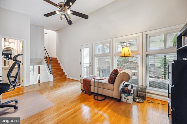 904 Hyde Rd, Silver Spring, MD 20902 - office space featuring wood finished floors, healthy amount of natural light, ceiling fan, and a towering ceiling