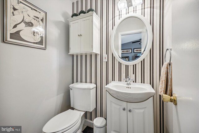 904 Hyde Rd, Silver Spring, MD 20902 - half bath with wallpapered walls and vanity