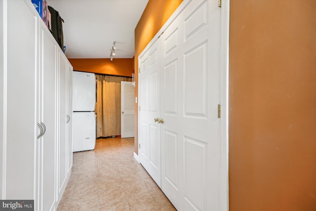 904 Hyde Rd, Silver Spring, MD 20902 - corridor featuring light tile patterned floors and rail lighting