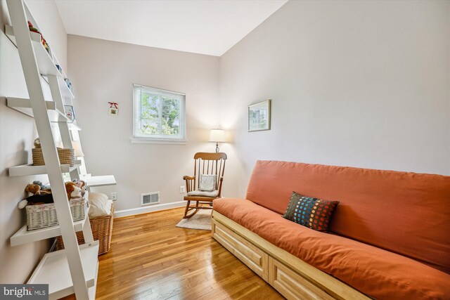 904 Hyde Rd, Silver Spring, MD 20902 - sitting room with light wood-style flooring and baseboards