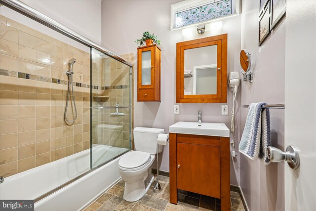 904 Hyde Rd, Silver Spring, MD 20902 - full bath with vanity and shower / bath combination with glass door