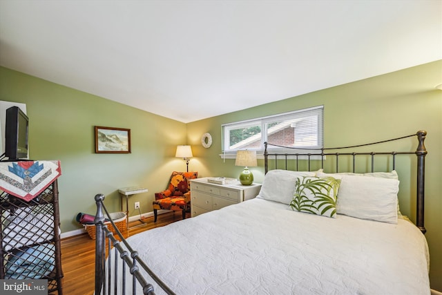 904 Hyde Rd, Silver Spring, MD 20902 - bedroom with wood finished floors and lofted ceiling