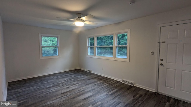 1414 Osborne Dr, Port Norris, NJ 08349 - spare room with dark wood-type flooring, ceiling fan, and a smoke detector