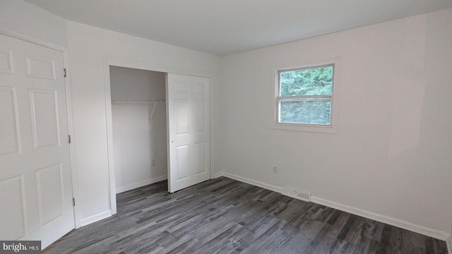 1414 Osborne Dr, Port Norris, NJ 08349 - unfurnished bedroom with dark wood-type flooring and a closet
