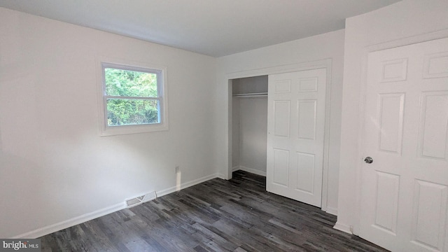 1414 Osborne Dr, Port Norris, NJ 08349 - unfurnished bedroom featuring dark wood-style flooring and a closet