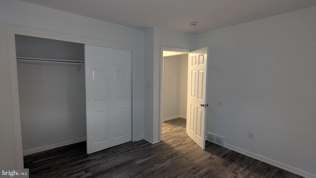 1414 Osborne Dr, Port Norris, NJ 08349 - unfurnished bedroom featuring dark wood-style floors and a closet