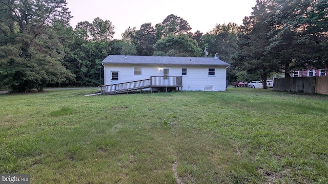 1414 Osborne Dr, Port Norris, NJ 08349 - rear view of house with a deck and a lawn